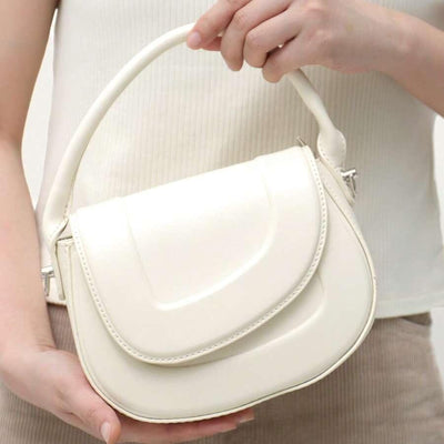Charlotte - Bolso Saddle de cuero con estilo