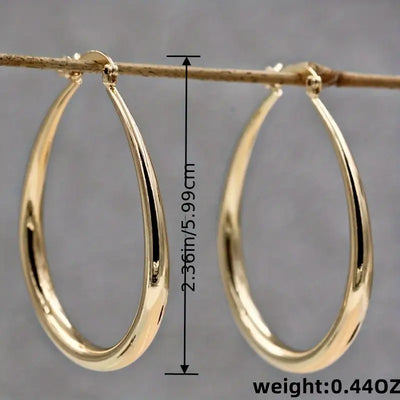 Elegantes pendientes de aro dorados
