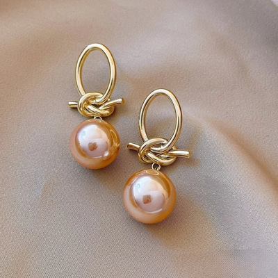 Elegantes pendientes colgantes de perlas rosas