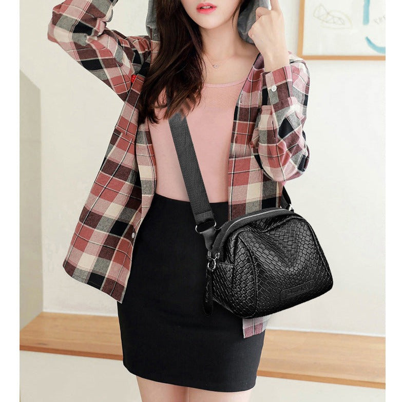 Louise - Bolso de piel con dije real 