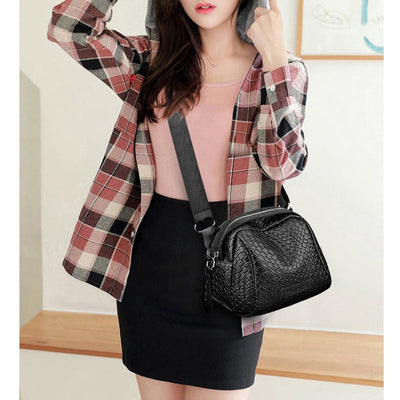 Louise - Bolso de piel con dije real 