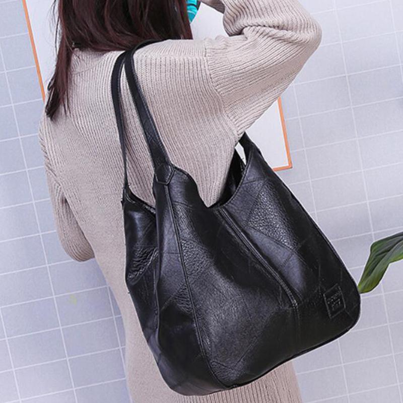 Madeline - Bolso tote de cuero con dijes reales