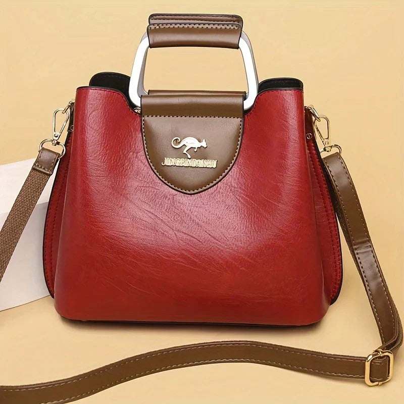 Isabella - Elegante bolso de cuero tipo cubo