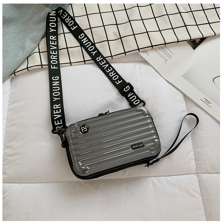 Riley - Mini maleta con estilo