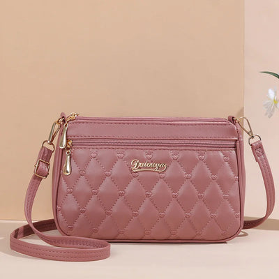 Lily - Bolso bandolera de piel con elegancia eterna 