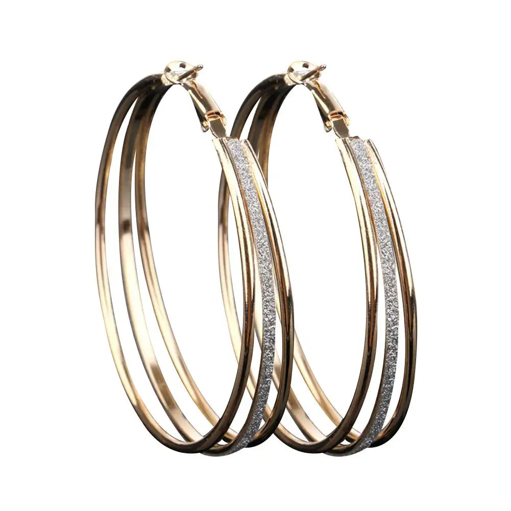 Pendientes de aro dorados retro 