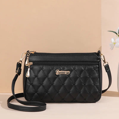 Lily - Bolso bandolera de piel con elegancia eterna 
