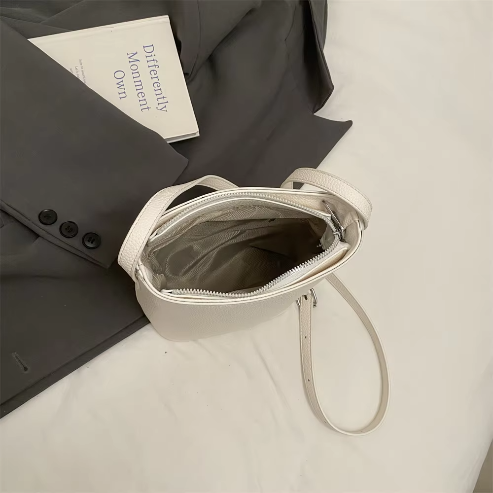 Helen - Elegante bolso de cuero tipo cubo estilo regio