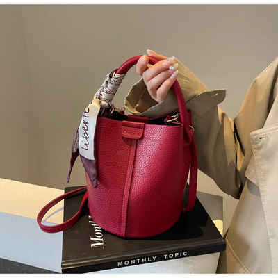 Rose - Bolso de cuero estilo cubo con un toque moderno