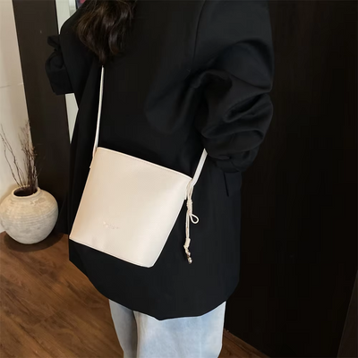 Helen - Elegante bolso de cuero tipo cubo estilo regio