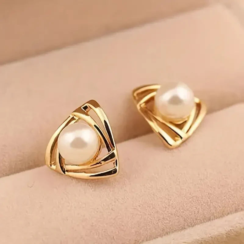 Exquisitos pendientes de perlas y oro